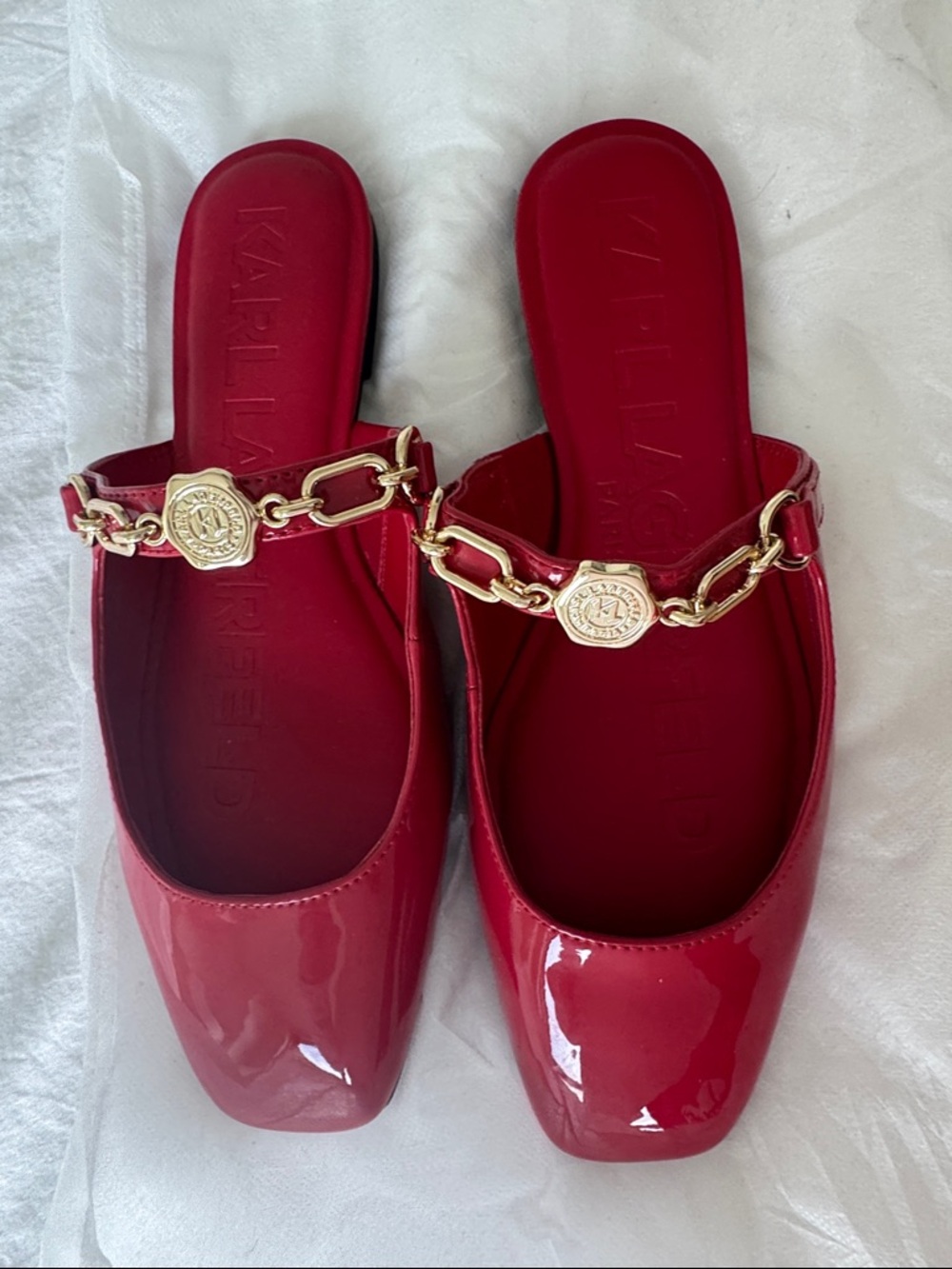 Karl Lagerfeld Red Patent Slip-On Mules with Gold Chain Medallion